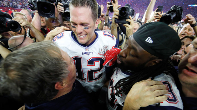 HOUSTON, TX - FEBRUARY 05: Head coach Bill Belichick, Tom Brady #12 and LeGarrette Blount #29 of the New England Patriots celebrate after defeating the Atlanta Falcons during Super Bowl 51 at NRG Stadium on February 5, 2017 in Houston, Texas. The Patriots defeated the Falcons 34-28. (Photo by Kevin C. Cox/Getty Images)